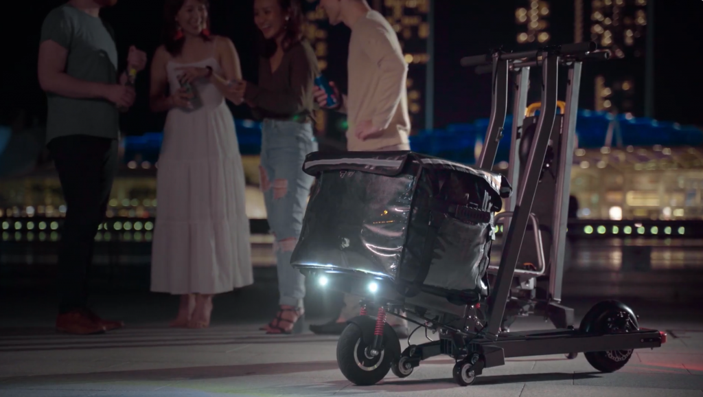 Image from This Transforming E-Scooter Has a Built-in Cargo Area