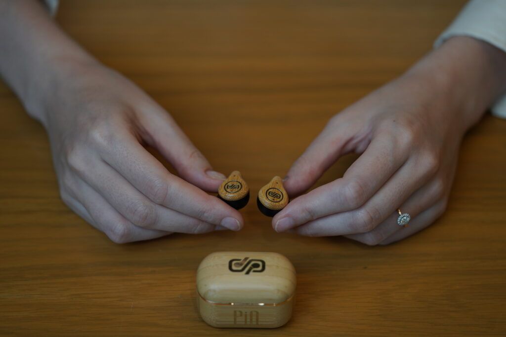 Image from The PIN: Luxury Wooden Earbuds With Built-In AI Translation